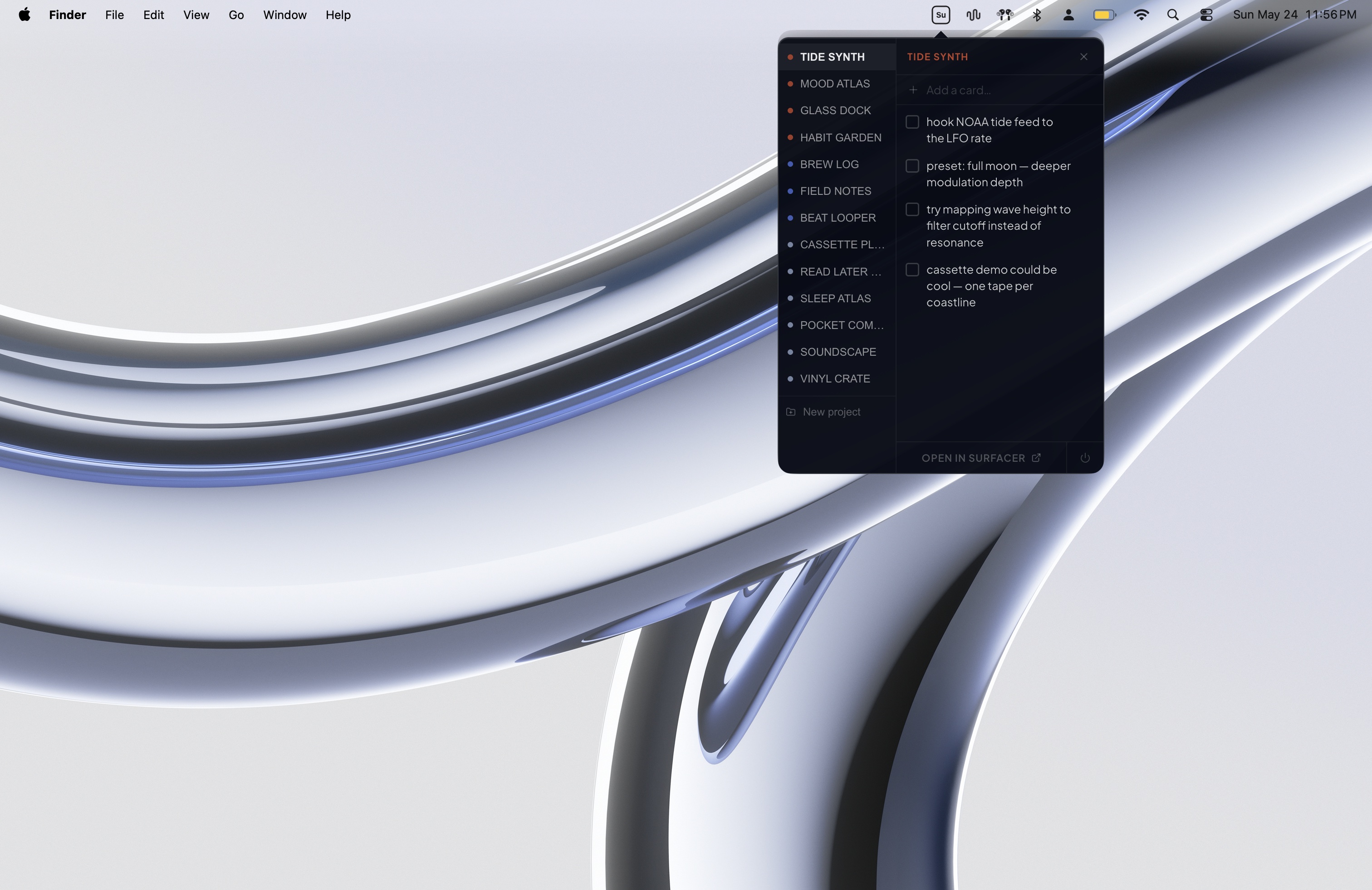 Menu-bar popover open on the desktop — Surfacer